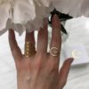 Bague symbole acier inox doré