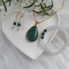 bijoux en pierres naturelles pendentif bracelet et boucle d'oreilles malachite et cristal de roche